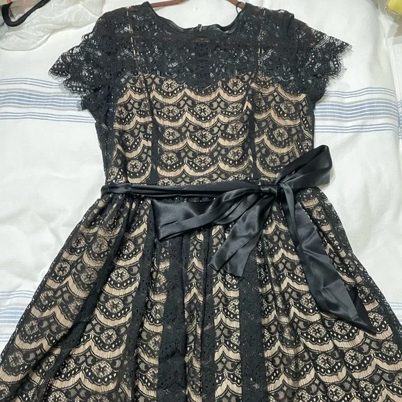 Morgan McFeeters black lace dress with tan lining, US size 14.